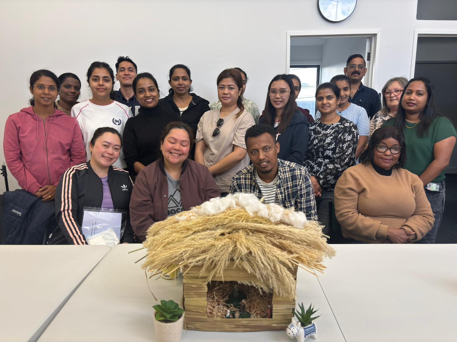 Healthcare professionals in a group self-reflection session for OSCE exam preparation